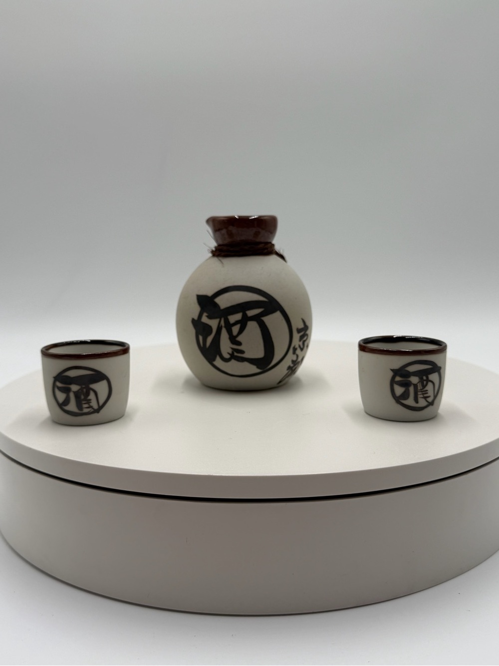 Hand-Painted Ceramic Sake Set in Cream and Brown